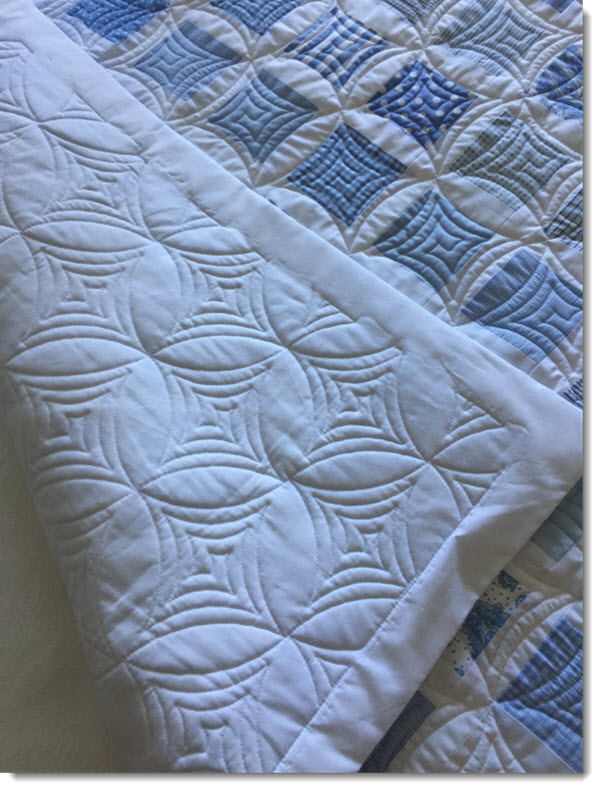 patchwork cot quilt/play mat - light blue diagonal