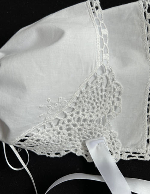 Hankie bonnet with crochet edge